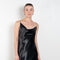 The Elizabeth Maxi Dress by Anna October is a flowing evening dress with an open back