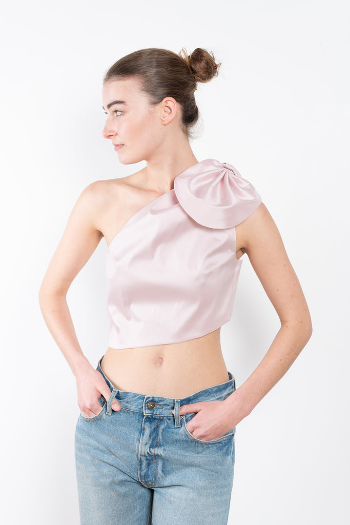 The Top Carlotta by Bernadette is a one shoulder summer top in a crisp taffeta with a delivate petal knot detail