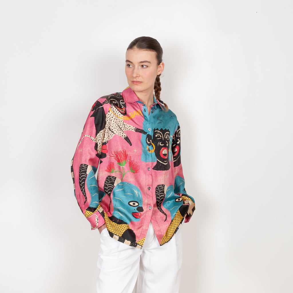 The Classic Shirt by Botter is a signature relaxed silk shirt in a seasonal pink heads print