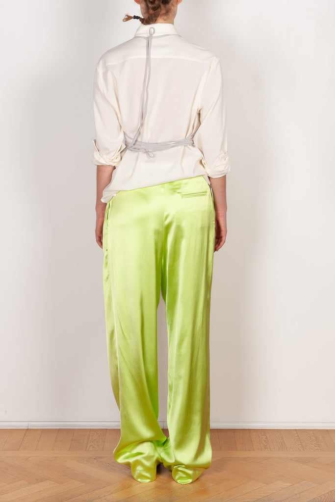 The Pyjama Trousers by Botter are relaxed silk drawstring trousers in a vibrant lime color