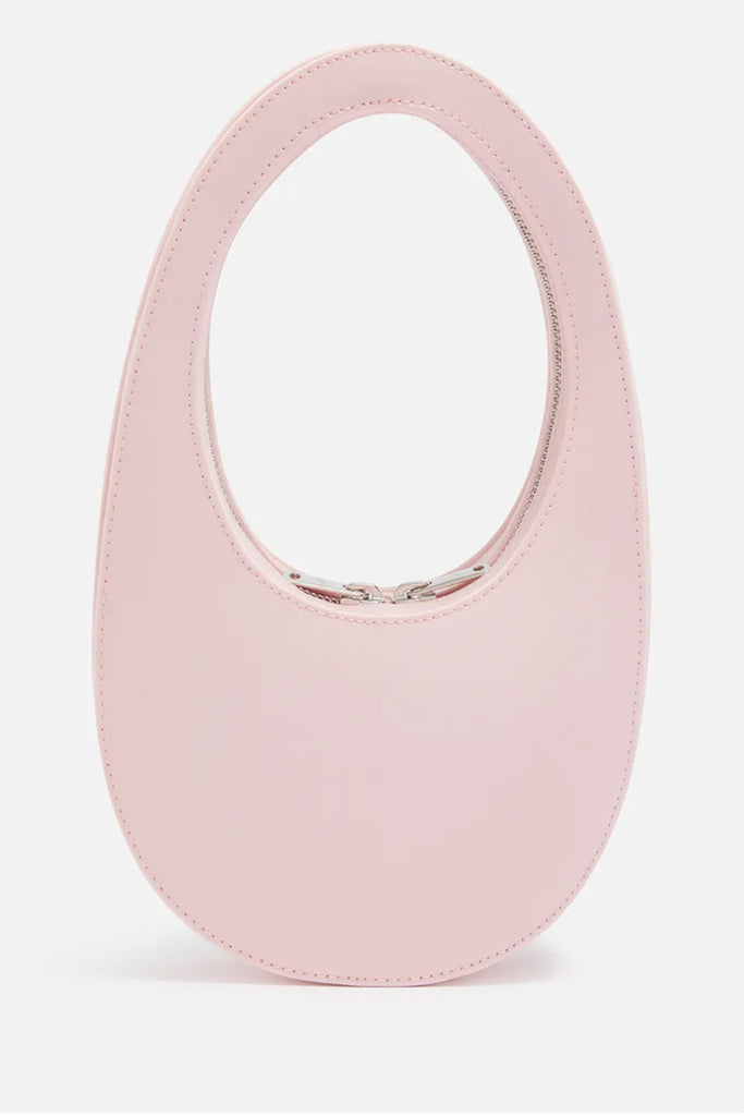 The Satin Swipe Bag by Coperni is Coperni's classic oval-shaped bag in a seasonal pink satin finish
