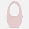 The Satin Swipe Bag by Coperni is Coperni's classic oval-shaped bag in a seasonal pink satin finish