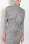 The Jersey Dress by Meryll Rogge is a long sleeve dress with a sensual deep V open back in a soft and flowy jersey