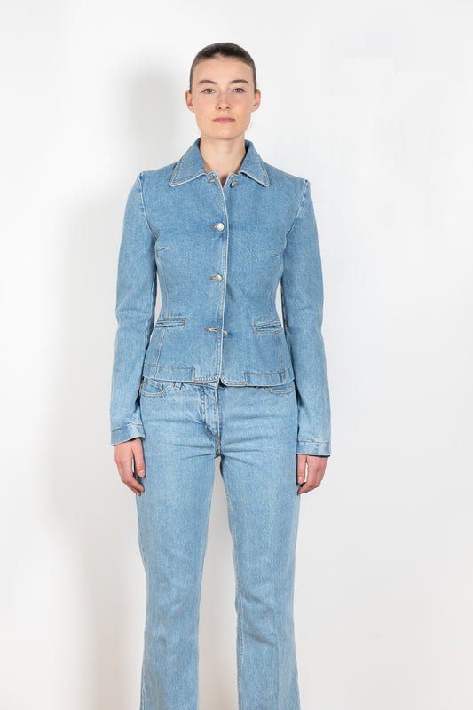 The Denim Blazer by Magda Butrym is a signature fitted denim jacket in a structured cotton with a peplum fit