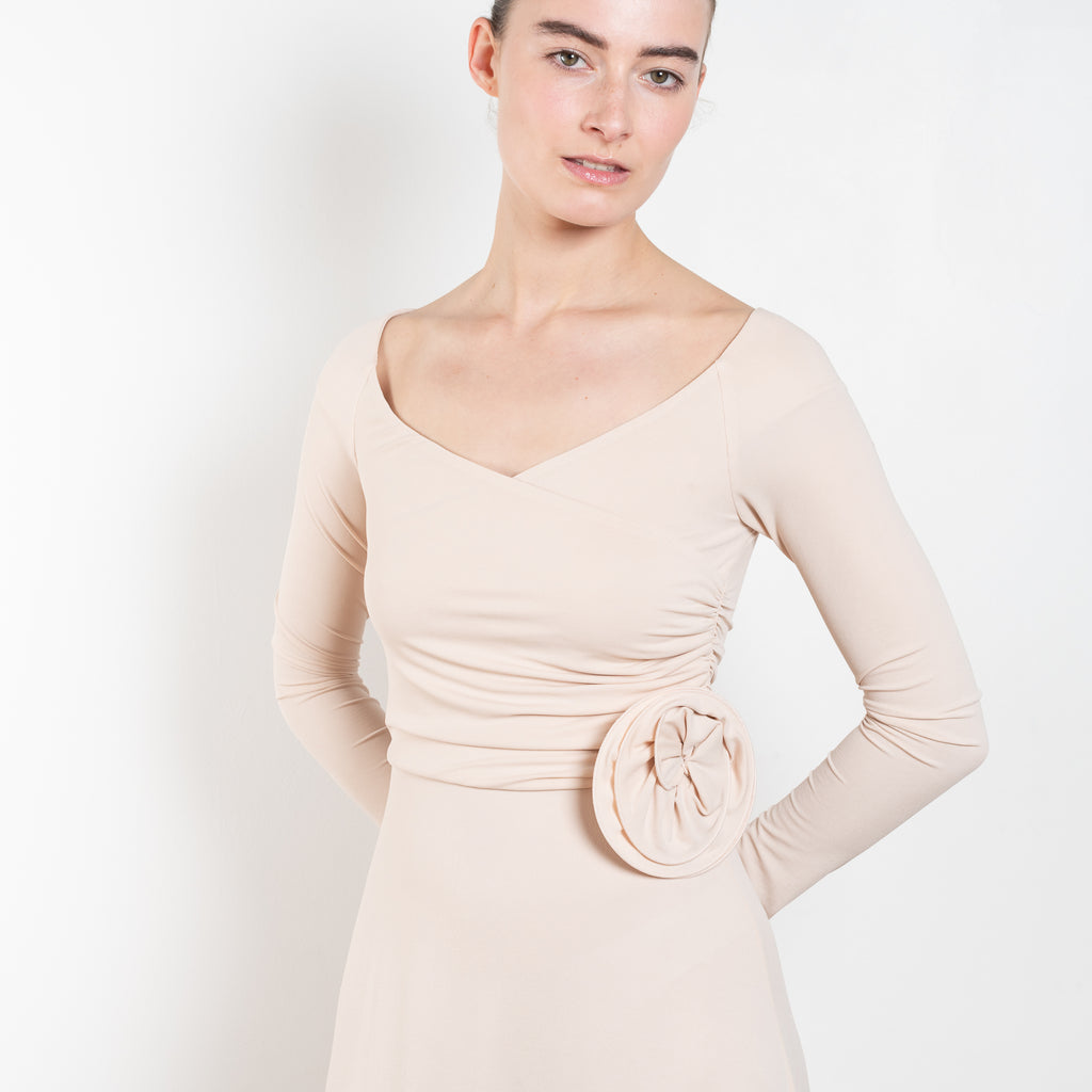The Jersey Wrap Dress 21 by Magda Butrym is an elegant wrap dress with a v neck ballerina neckline, long off the shoulder sleeves, and an a-line midi skirt