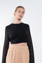 The Lea Top by THE ANDAMANE is a black cropped silk top with a flattering open back
