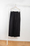 The Domond Pants by Baserange are high waisted loose trousers in black linen