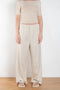 The Stoa Pants by Baserange are high waisted loose trousers in undyed organic cotton
