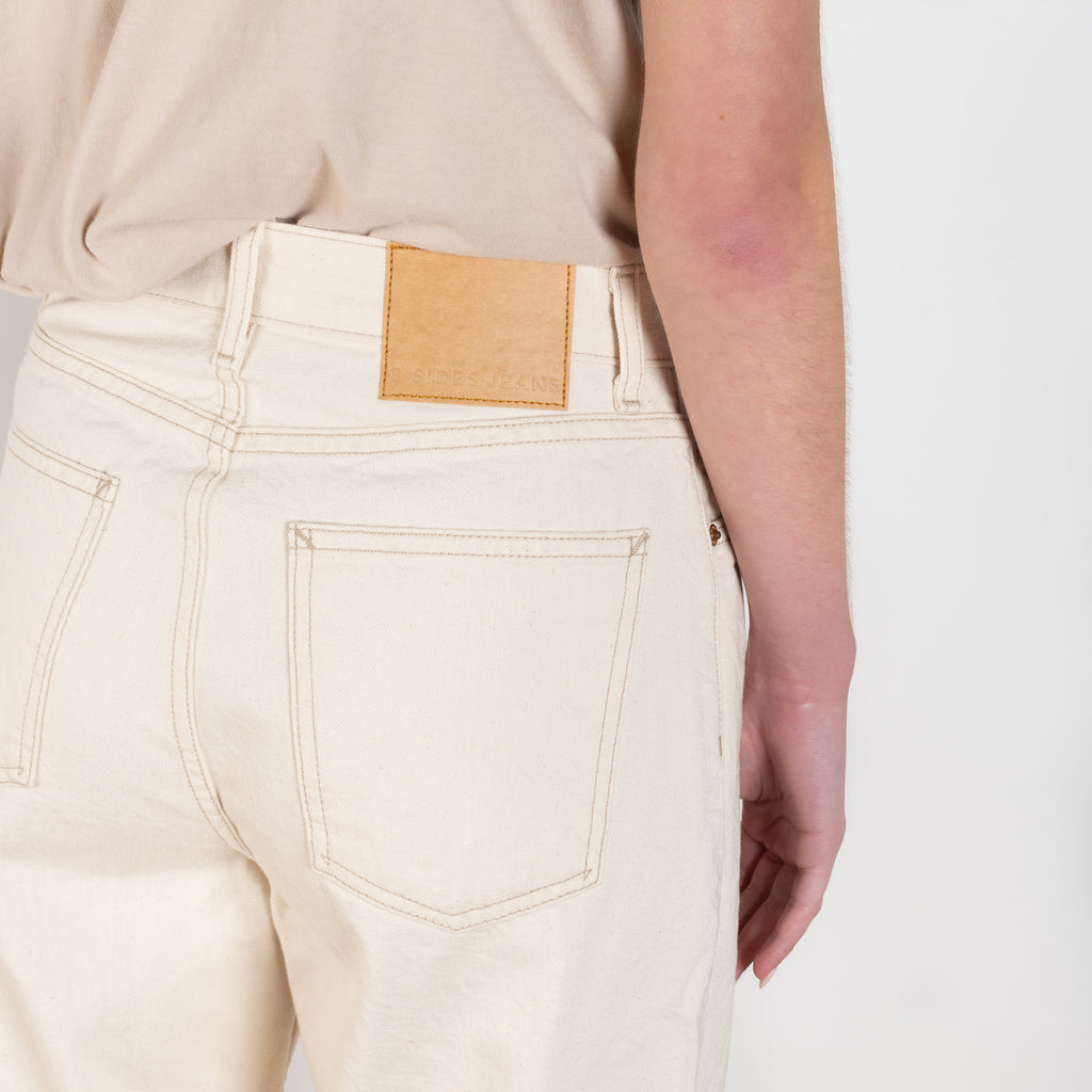 The Elissa Jeans by B SIDES is a high waisted jeans with a relaxed wide leg in a undyed ecru cotton denim