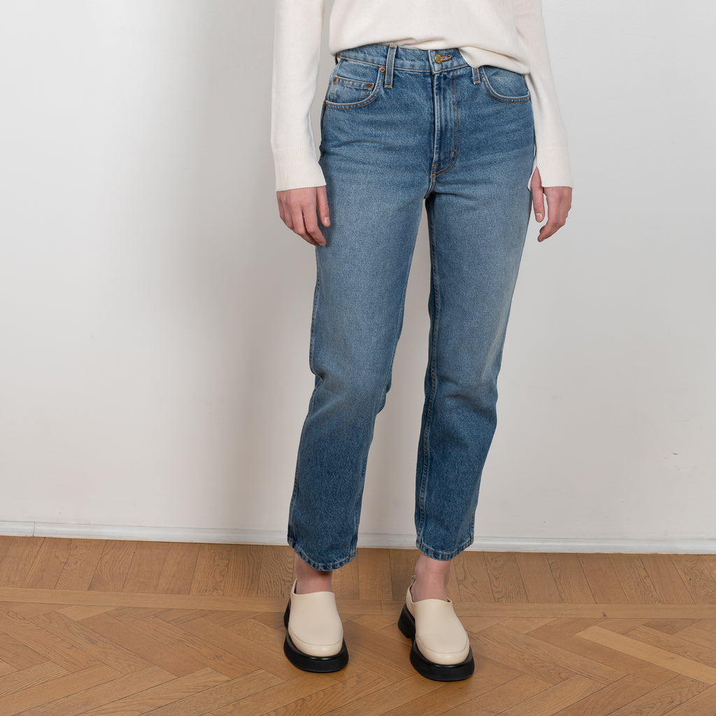 The Louis Hi Slim jeans by  is a high waisted jeans with a fitted straight leg in a vintage medium blue wash