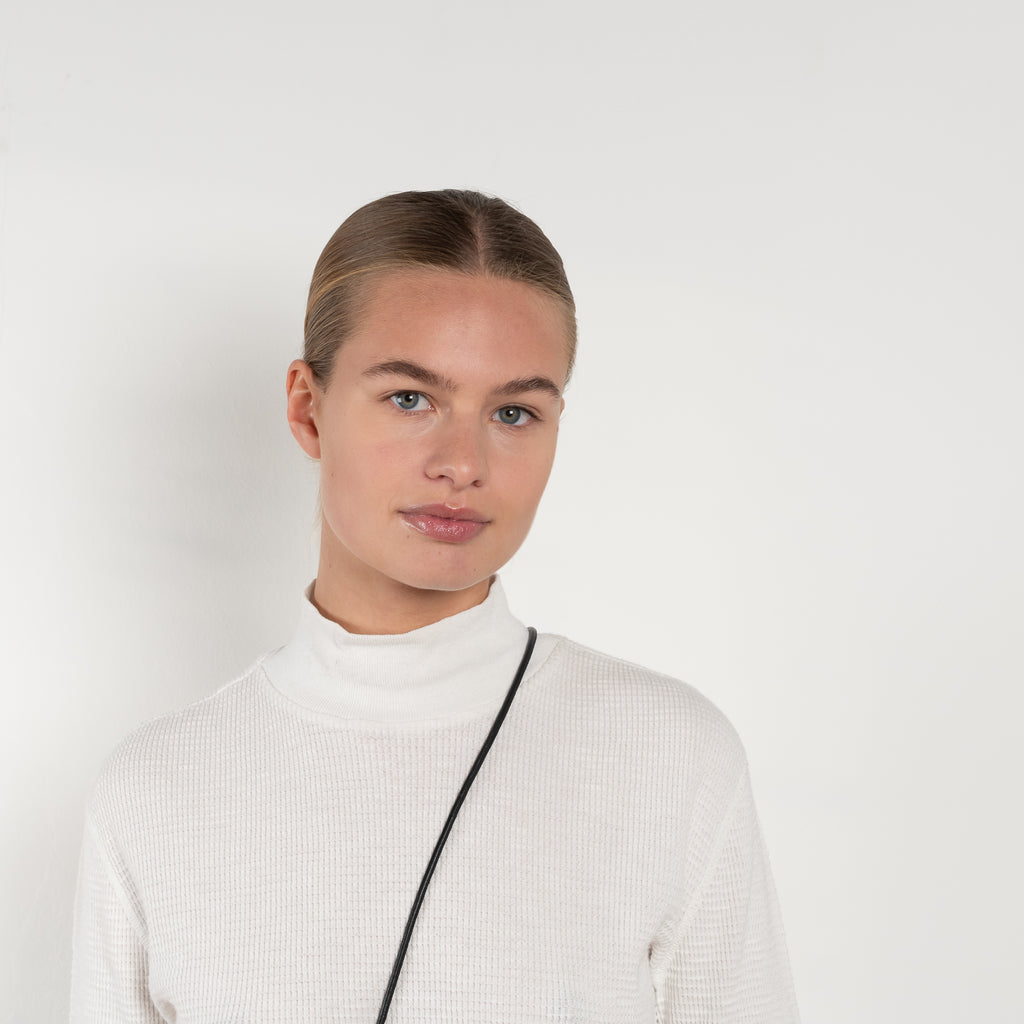 The Thermal Mock Neck by Redone is a signature relaxed Mock Neck Tee with long sleeves in a soft cotton in made collaboration with Hanes