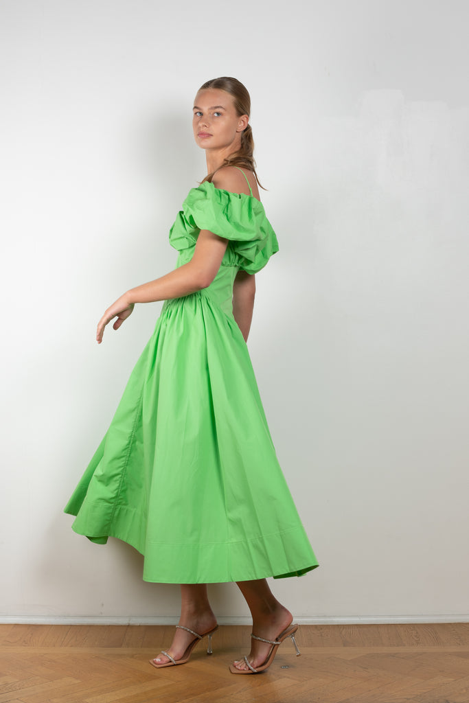 The Erin Dress by Rejina Pyo is an off-the-shoulder dress with puffed sleeves from this Fall's runway