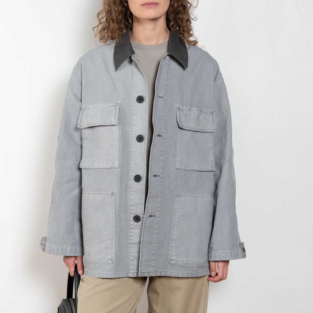 The Barn Jacket by 6397 is a cotton canvas jacket with workwear details and a contrasted waxed canvas collar