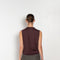 The Button Vest by 6397 is a sleeveless cashmere vest with buttons, a perfect layering piece