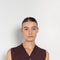 The Button Vest by 6397 is a sleeveless cashmere vest with buttons, a perfect layering piece
