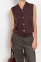 The Button Vest by 6397 is a sleeveless cashmere vest with buttons, a perfect layering piece