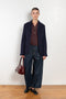 The Button Vest by 6397 is a sleeveless cashmere vest with buttons, a perfect layering piece