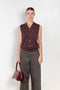 The Button Vest by 6397 is a sleeveless cashmere vest with buttons, a perfect layering piece