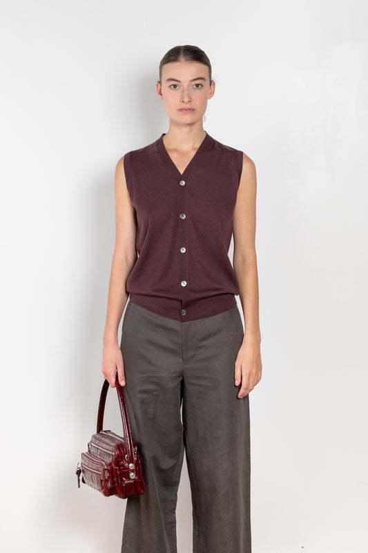 The Button Vest by 6397 is a sleeveless cashmere vest with buttons, a perfect layering piece