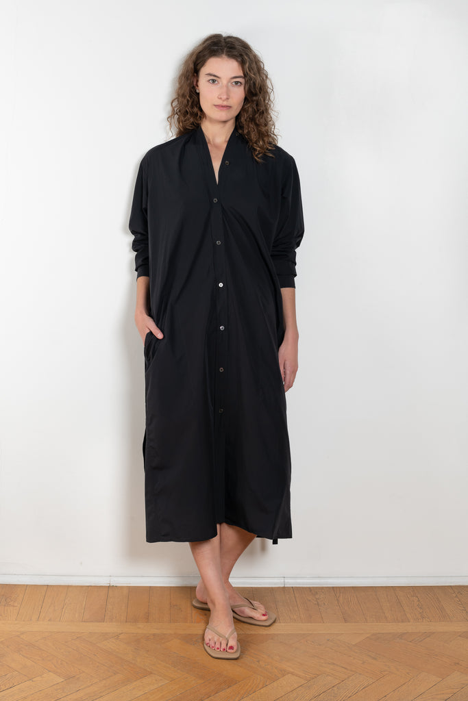 The Collarless Shirtdress by 6397 is a superfine cotton dress with a soft sheerness and full button closure