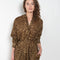 The Collarless Shirtdress by 6397 is a superfine cotton dress with a soft sheerness and full button closure