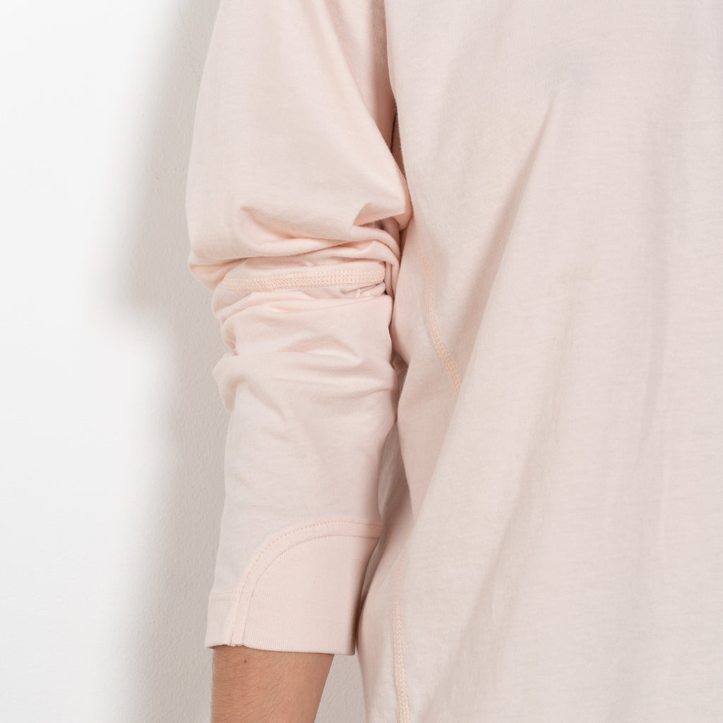 The Coverstitch Tee by 6397 is a long sleeve Tee with subtle, tonal cover stitch details throughout the body in a soft Peruvian cotton jersey