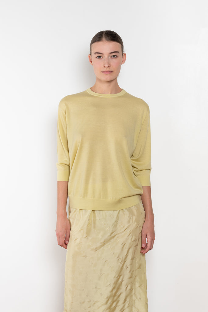 The Elbow Crew Top by 6397 is a relaxed cashmere and wool blend top with a yoke detail on the back