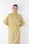 The Elbow Crew Top by 6397 is a relaxed cashmere and wool blend top with a yoke detail on the back