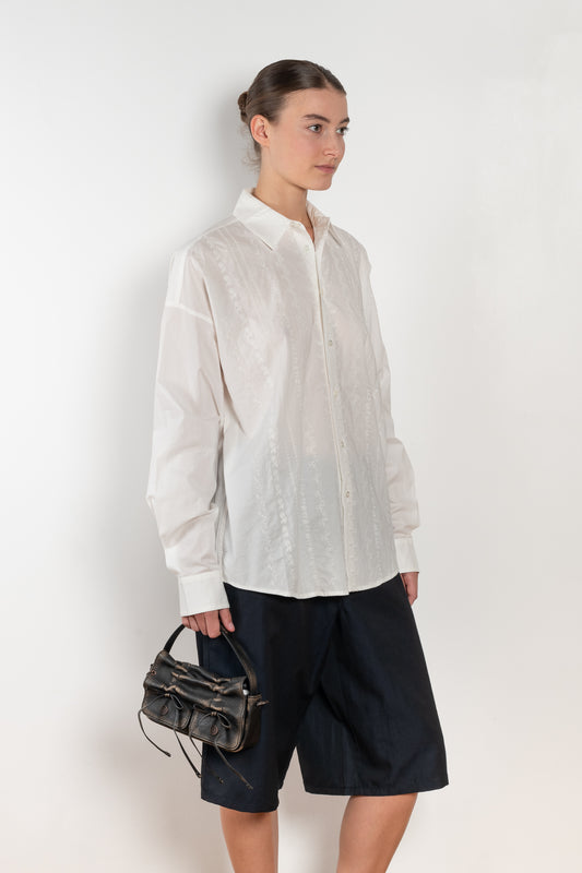 The New Uniform Top by 6397 is a signature oversized boxy cotton shirt with white tonal floral embroidery