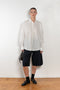 The New Uniform Top by 6397 is a signature oversized boxy cotton shirt with white tonal floral embroidery
