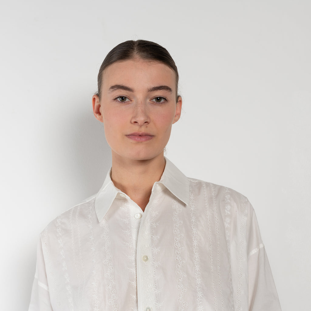 The New Uniform Top by 6397 is a signature oversized boxy cotton shirt with white tonal floral embroidery