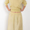 The Embroidered slip Skirt by 6397 in silk habotai has a tonal embroidered dot all over and and an elasticated waist