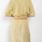 The Embroidered slip Skirt by 6397 in silk habotai has a tonal embroidered dot all over and and an elasticated waist