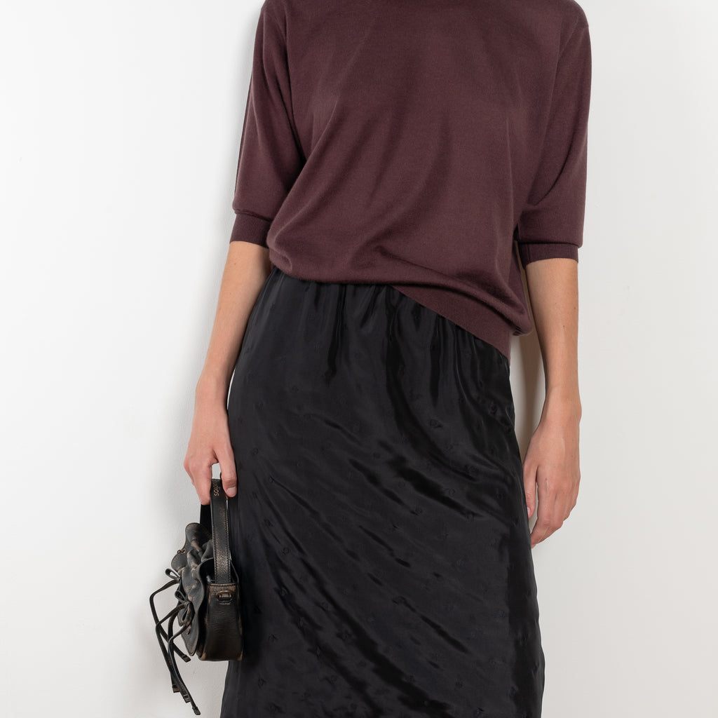 The Embroidered slip Skirt by 6397 in silk habotai has a tonal embroidered dot all over and and an elasticated waist