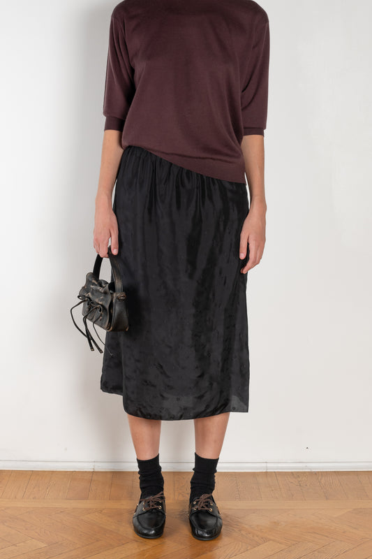 The Embroidered slip Skirt by 6397 in silk habotai has a tonal embroidered dot all over and and an elasticated waist