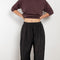 The Inside Out Drawstring Pant by 6397 in silk habotai has a subtle monochromatic print with 'inside out' finishing