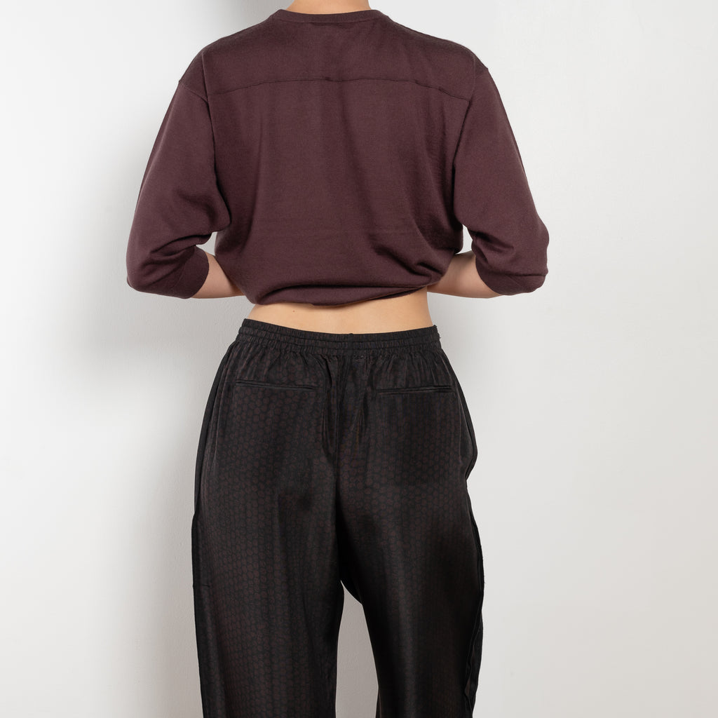 The Inside Out Drawstring Pant by 6397 in silk habotai has a subtle monochromatic print with 'inside out' finishing