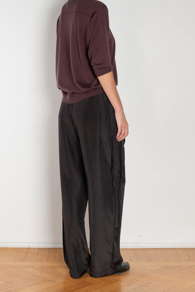 The Inside Out Drawstring Pant by 6397 in silk habotai has a subtle monochromatic print with 'inside out' finishing
