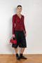 The Skinny Rib Cardigan by 6397 is a slightly sheer wool ribbed cardigan, a feminine piece to be worn as a top