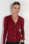 The Skinny Rib Cardigan by 6397 is a slightly sheer wool ribbed cardigan, a feminine piece to be worn as a top