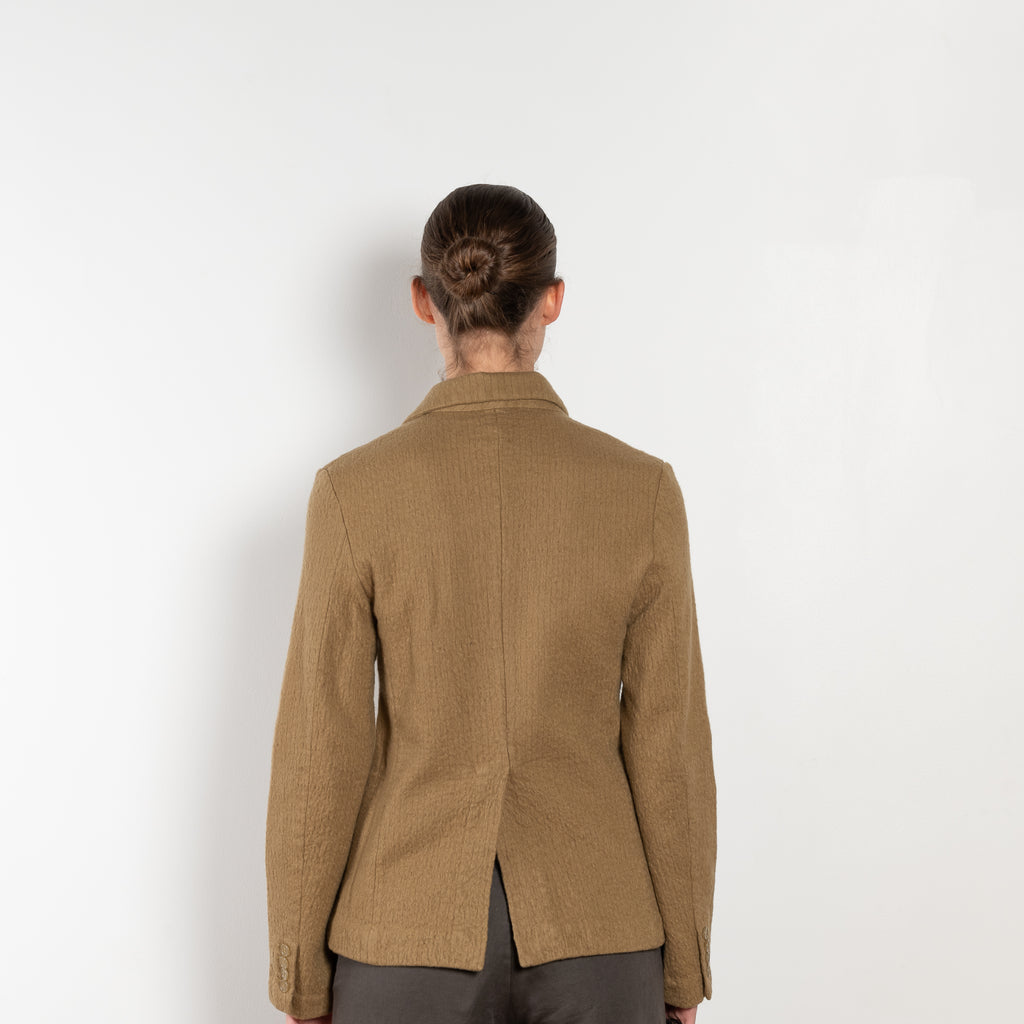 The Boiled Pinstripe Blazer by 6397 is a fitted buttoned jacket in a boiled wool with a delicate pinstripe pattern