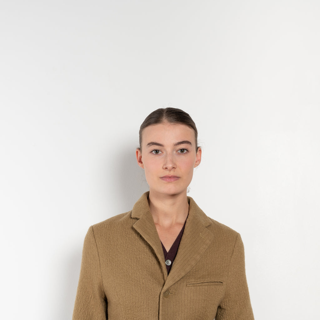 The Boiled Pinstripe Blazer by 6397 is a fitted buttoned jacket in a boiled wool with a delicate pinstripe pattern