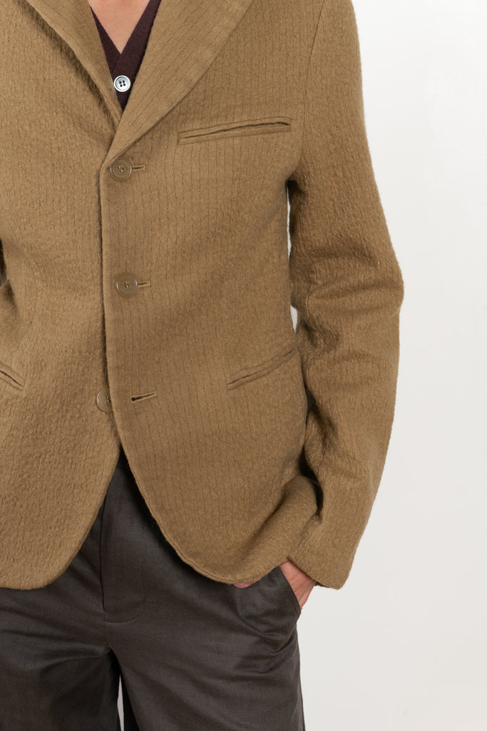 The Boiled Pinstripe Blazer by 6397 is a fitted buttoned jacket in a boiled wool with a delicate pinstripe pattern