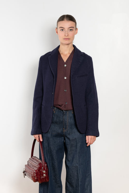 The Boiled Pinstripe Blazer by 6397 is a fitted buttoned jacket in a boiled wool with a delicate pinstripe pattern