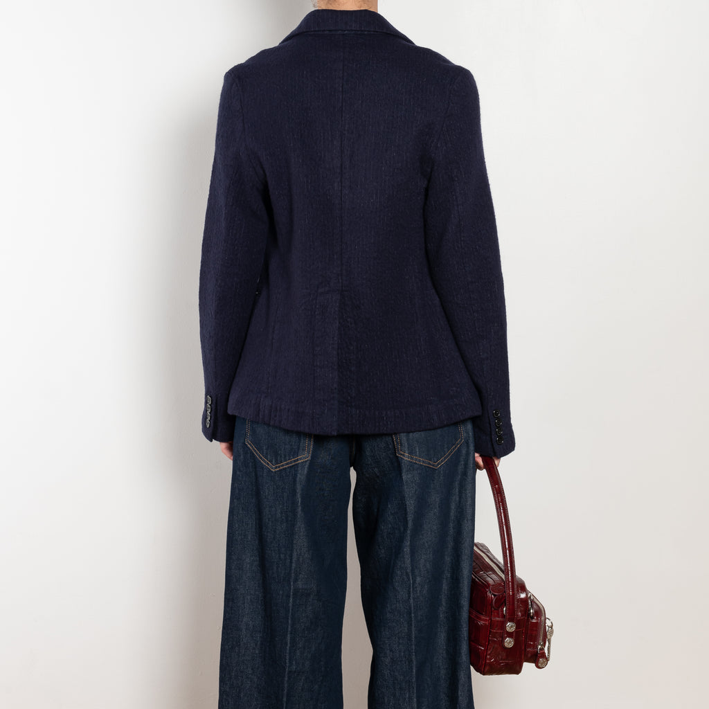 The Boiled Pinstripe Blazer by 6397 is a fitted buttoned jacket in a boiled wool with a delicate pinstripe pattern