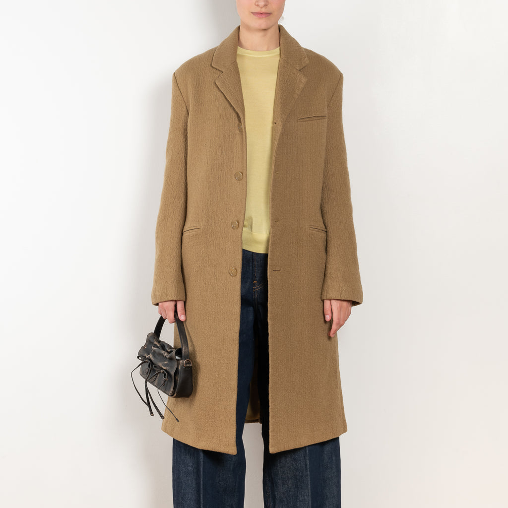 The Boiled Pinstripe Coat by 6397 is a fitted long coat in a boiled wool with a delicate pinstripe pattern