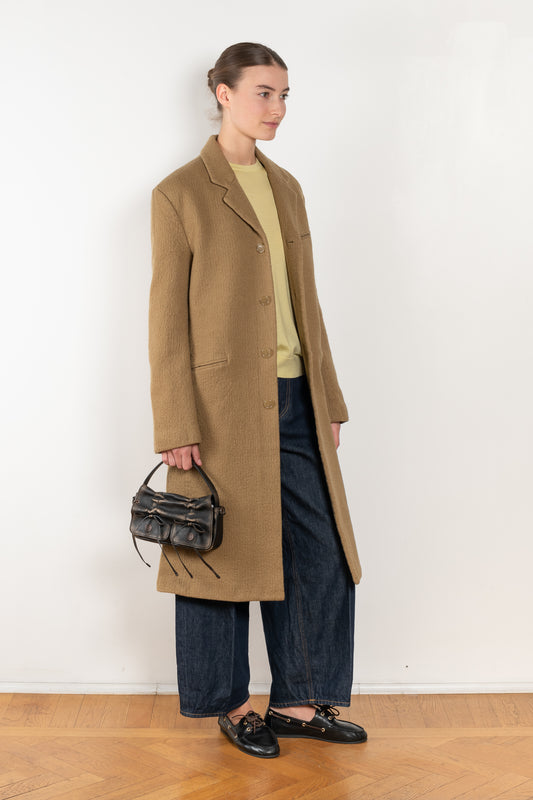 The Boiled Pinstripe Coat by 6397 is a fitted long coat in a boiled wool with a delicate pinstripe pattern