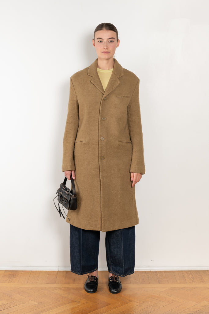 The Boiled Pinstripe Coat by 6397 is a fitted long coat in a boiled wool with a delicate pinstripe pattern