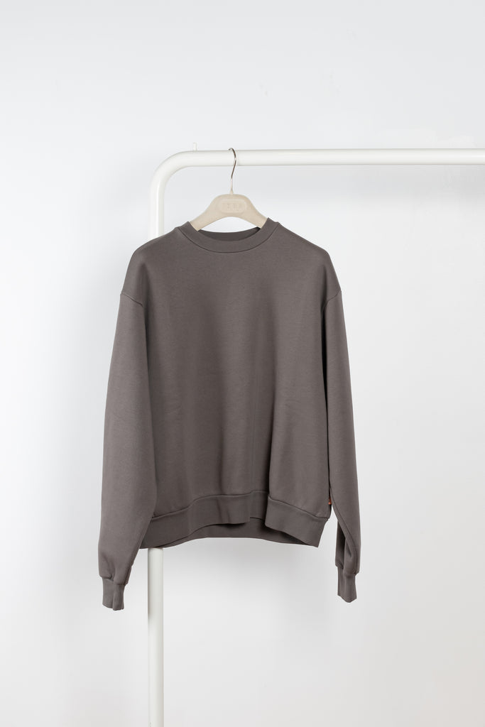 The Crew Neck Sweater 012 by Acne Studios is a crew neck sweater with ribbed cuffs and hem