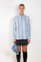 The Striped Shirt 51 by Acne Studios has an all-over stripe pattern and is detailed with a micro face logo embroidery on the chest and a face logo on the back